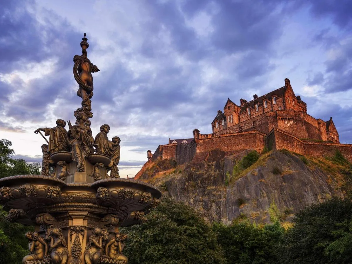 a statue in front of a castle on a hill at Mercure Edinburgh Haymarket in Edinburgh